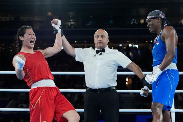 1723336706553090562.jpg 巴黎奥运会丨拳击——女子75公斤级:中国选手李倩夺金+XxjpseC009834_20240811_MVPFN0A001.jpg